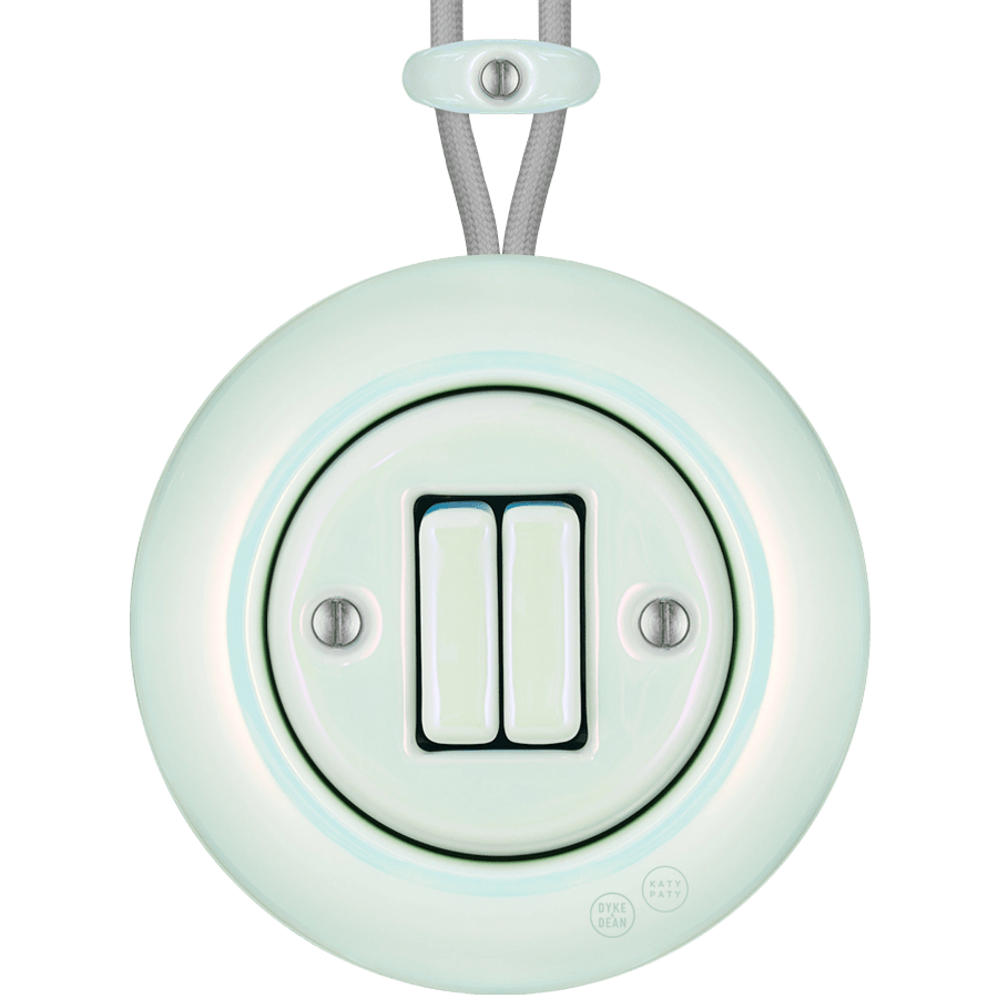 PORCELAIN KATY PATY COLONA ROUND SURFACE MOUNTED DOUBLE SLIM BUTTON SWITCH CONCHA - DYKE & DEAN