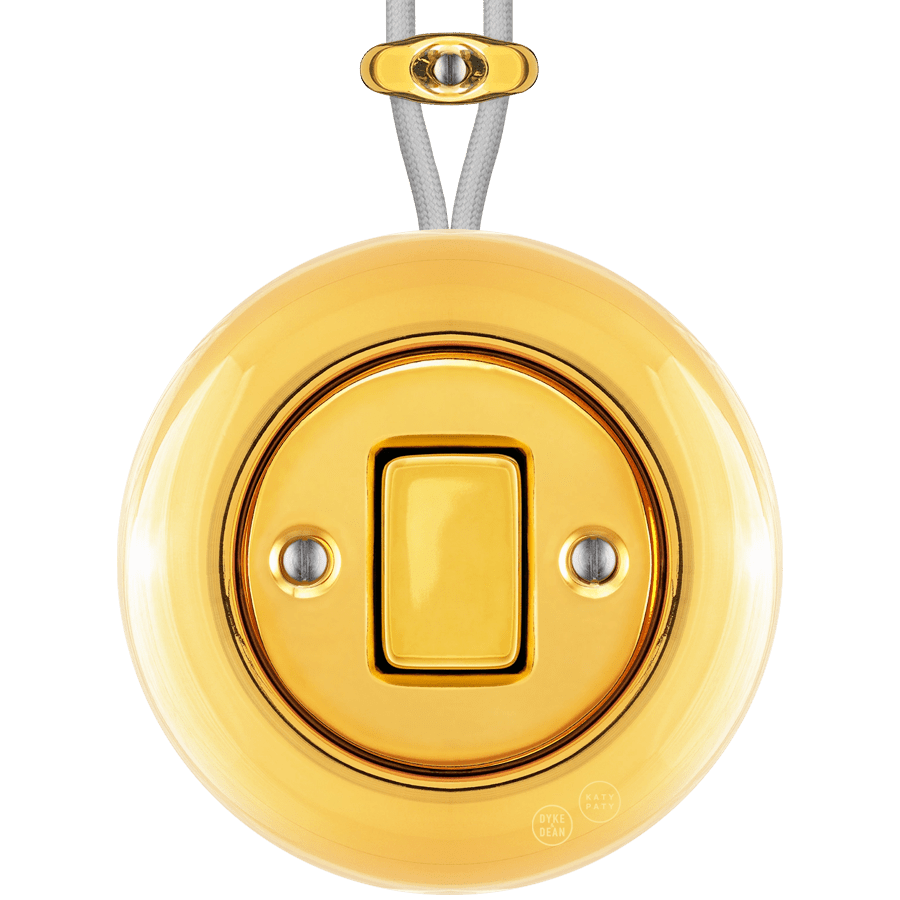 PORCELAIN KATY PATY COLONA ROUND SURFACE MOUNTED FAT BUTTON SWITCH GOLD - DYKE & DEAN