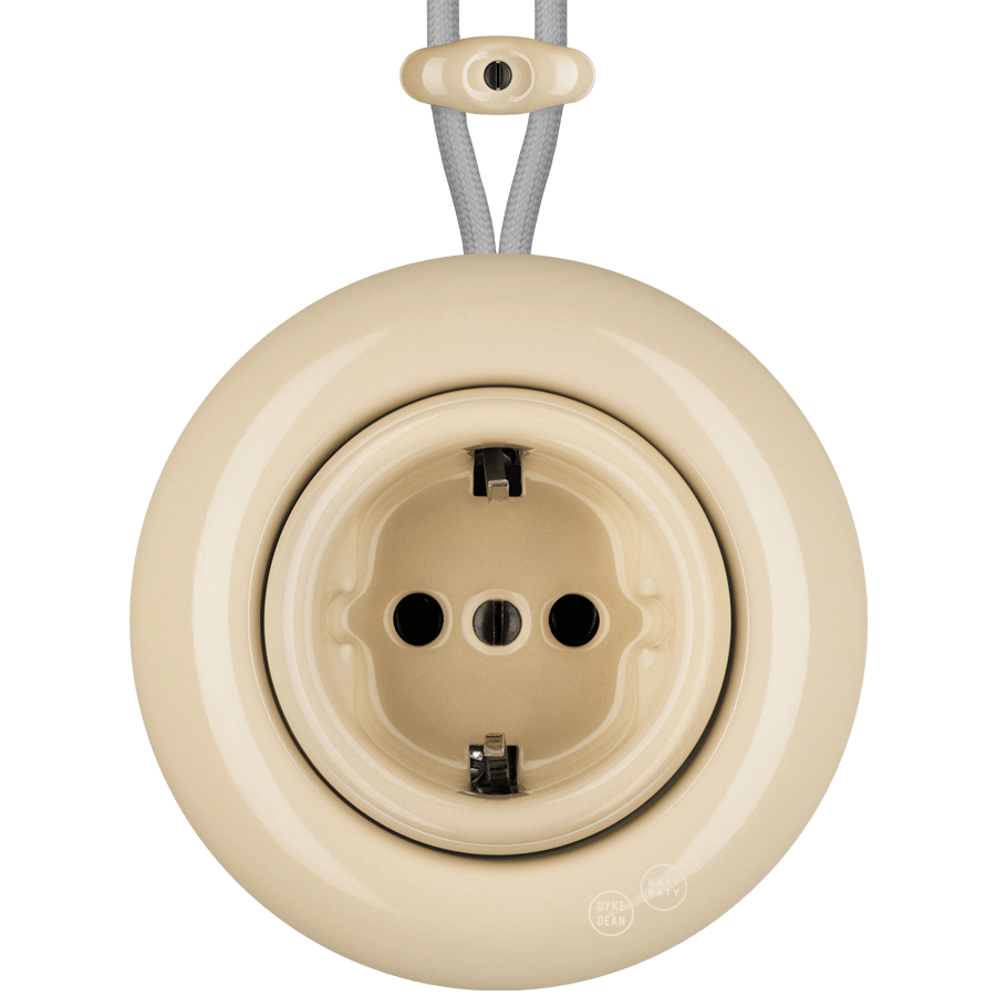 PORCELAIN KATY PATY COLONA ROUND SURFACE MOUNTED SCHUKO SOCKET SAND - DYKE & DEAN