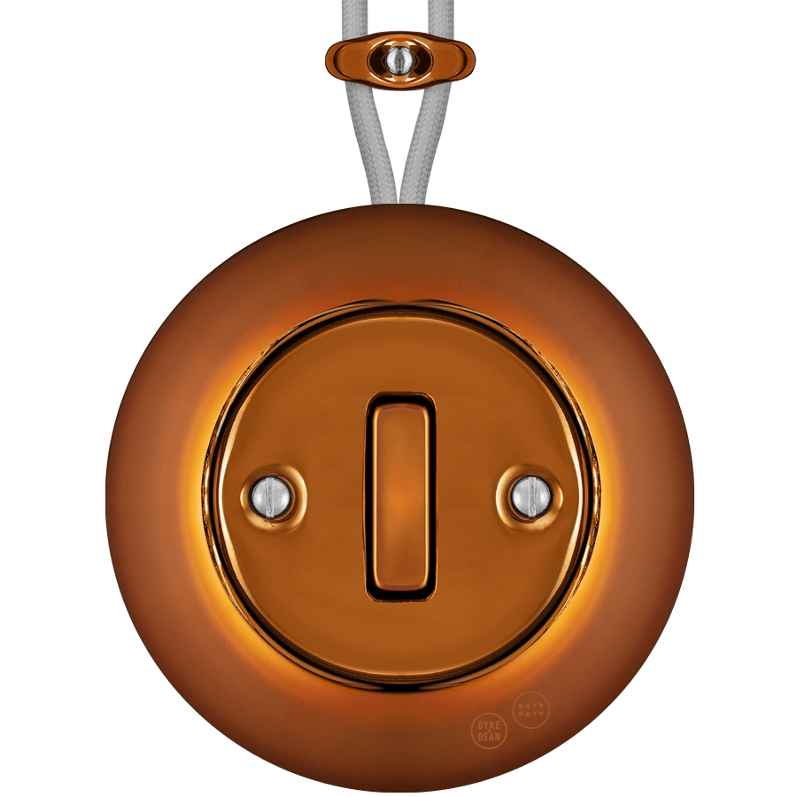 PORCELAIN KATY PATY COLONA ROUND SURFACE MOUNTED SLIM BUTTON SWITCH BRONZE - DYKE & DEAN