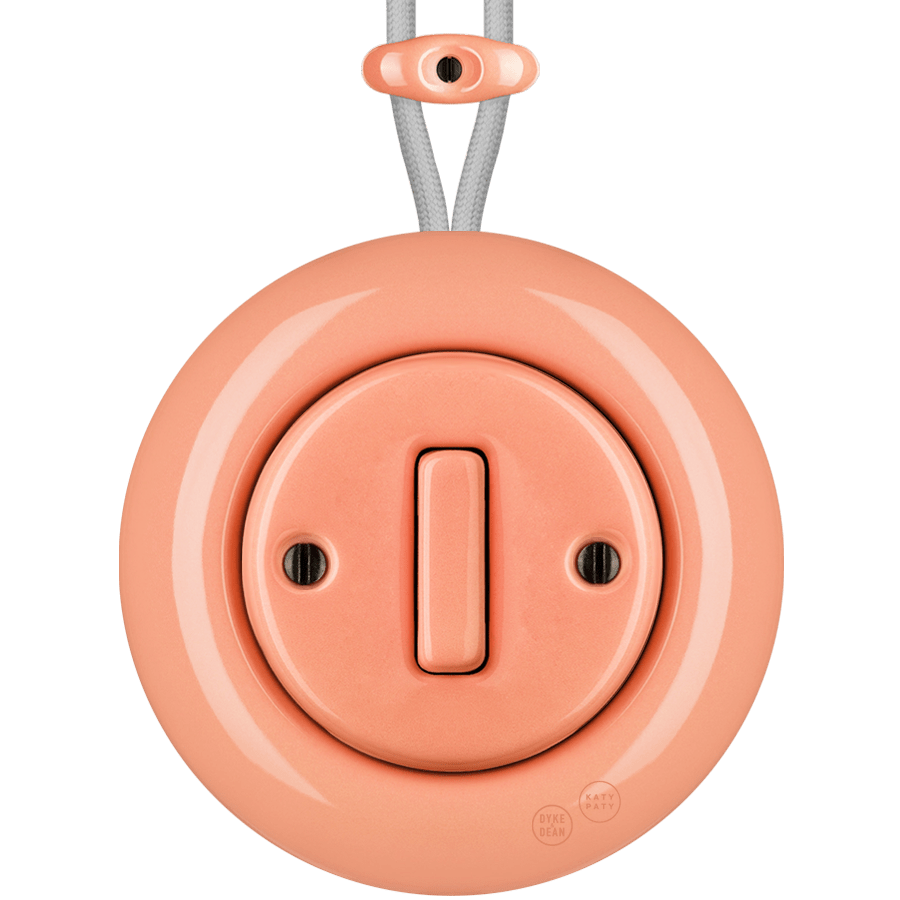 PORCELAIN KATY PATY COLONA ROUND SURFACE MOUNTED SLIM BUTTON SWITCH SALMON PINK - DYKE & DEAN