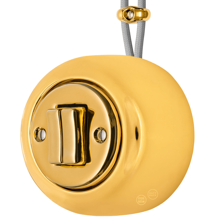 PORCELAIN ROUND SURFACE MOUNTED DOUBLE SLIM BUTTON SWITCH GOLD - DYKE & DEAN