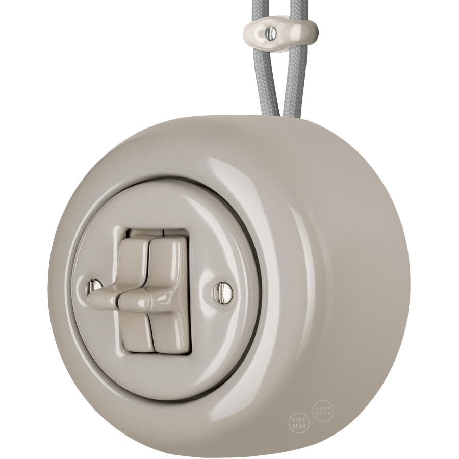 PORCELAIN ROUND SURFACE MOUNTED DOUBLE TOGGLE BUTTON SWITCH CAPPUCCINO - DYKE & DEAN