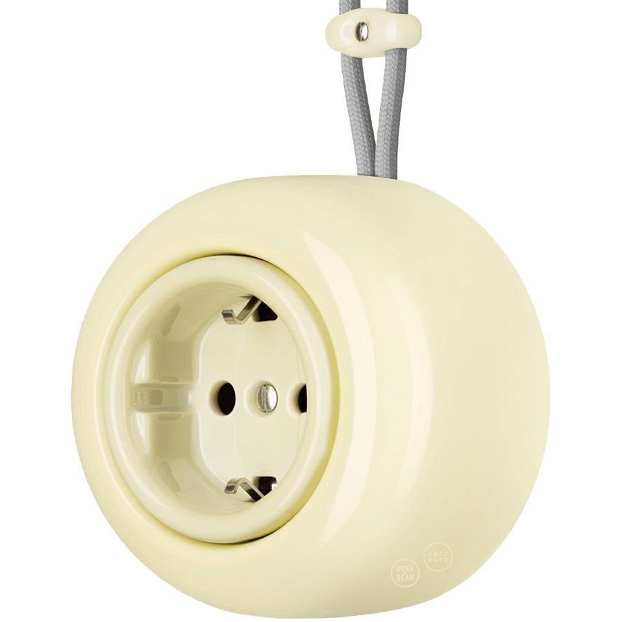 PORCELAIN ROUND SURFACE MOUNTED SCHUKO SOCKET VANILLA - DYKE & DEAN