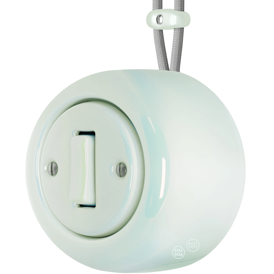 PORCELAIN ROUND SURFACE MOUNTED SLIM BUTTON SWITCH CONCHA - DYKE & DEAN