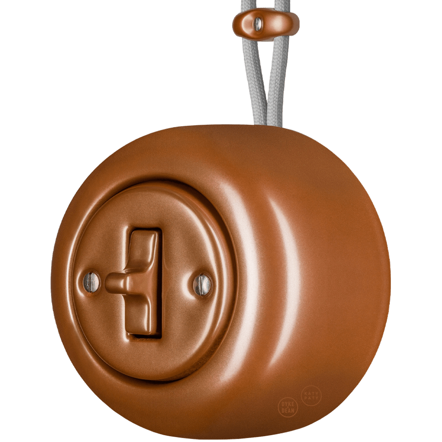 PORCELAIN ROUND SURFACE MOUNTED TOGGLE BUTTON SWITCH COPPER - DYKE & DEAN