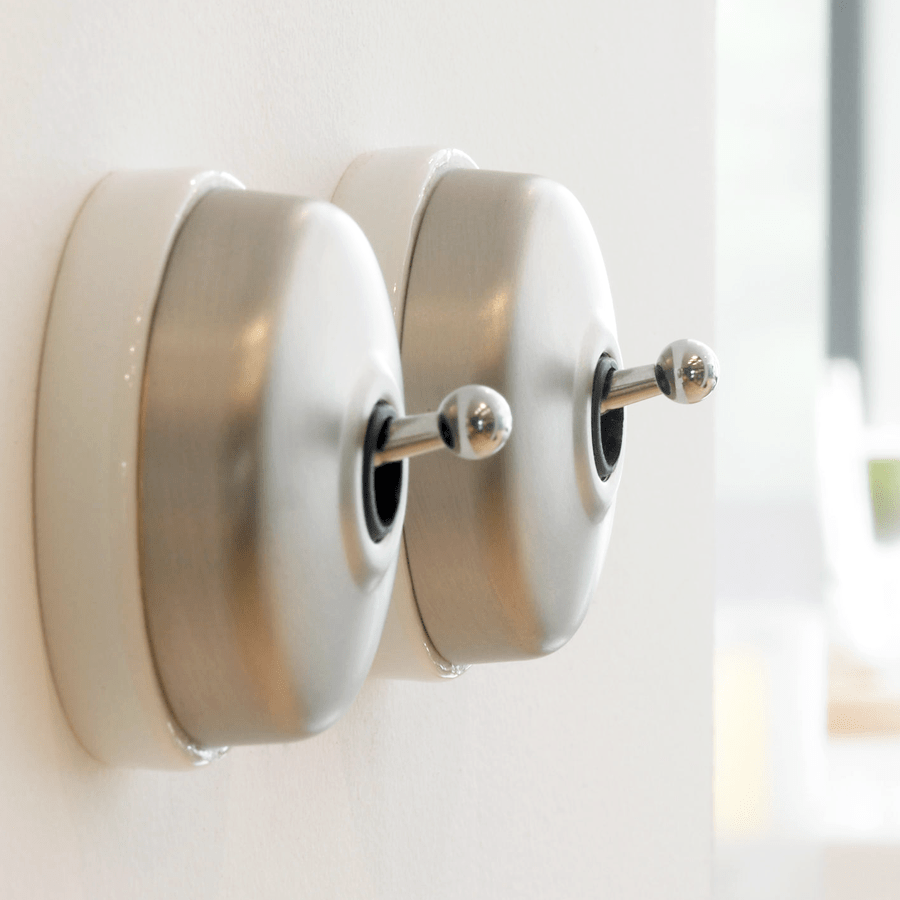 BRUSHED BRASS INTERMEDIATE WALL SWITCHES BLACK - DYKE & DEAN